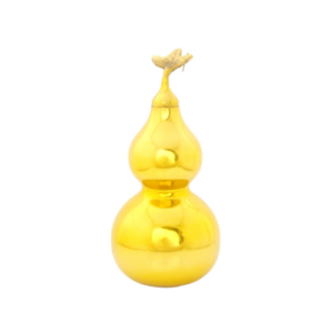 A shiny golden Wu Lou gourd with a smooth and reflective surface, topped with a small decorative leaf design. The Wu Lou, often associated with good health and longevity in Feng Shui, stands against a plain white background, highlighting its vibrant gold color and sleek, elegant appearance. This decorative item symbolizes prosperity and positive energy.