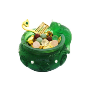 A decorative green wealth bowl featuring a detailed mongoose figure spouting jewels, symbolizing prosperity and abundance. The bowl is filled with various items representing wealth, including gold ingots, colorful gemstones, and coins. The vibrant green color and ornate designs on the bowl enhance its auspicious appearance, making it a popular Feng Shui item for attracting financial luck and positive energy.